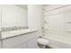 Clean bathroom with a bathtub, shower, toilet, and granite vanity at 15580 S Bentley Dr, Arizona City, AZ 85123