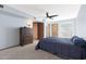 Bedroom with ensuite bathroom and ceiling fan at 18822 N 134Th Ave, Sun City West, AZ 85375