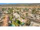 An aerial view of a residential neighborhood, featuring various houses and landscaping at 19436 N 36Th Pl, Phoenix, AZ 85050