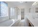 Bathroom featuring a bathtub and shower at 19436 N 36Th Pl, Phoenix, AZ 85050