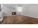 Living room featuring a fireplace and wood-look flooring at 19436 N 36Th Pl, Phoenix, AZ 85050