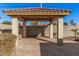 Covered patio with built-in grill and block wall for privacy at 2380 N Horseshoe Cir, Casa Grande, AZ 85122