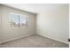 Simple bedroom with carpeted floor and window coverings at 23854 N 36Th Dr, Glendale, AZ 85310