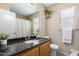 Bathroom with granite countertop, sink and toilet at 3619 N 104Th Dr, Avondale, AZ 85392