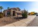 Two-story house with desert landscaping and a two-car garage at 3619 N 104Th Dr, Avondale, AZ 85392