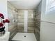 Updated bathroom with a walk-in shower and modern tile at 4222 N 48Th Ave, Phoenix, AZ 85031