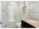Modern bathroom with a walk-in shower, grab bars, and updated vanity at 4779 N 205Th Gln, Buckeye, AZ 85396
