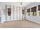 Spacious bedroom with neutral walls, carpeting, and multiple windows at 4779 N 205Th Gln, Buckeye, AZ 85396