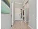 Bright entryway with light wood flooring and white walls at 4779 N 205Th Gln, Buckeye, AZ 85396
