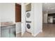 Convenient laundry room with stackable washer and dryer at 4779 N 205Th Gln, Buckeye, AZ 85396