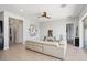 Spacious living area with light walls and a ceiling fan at 4779 N 205Th Gln, Buckeye, AZ 85396