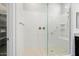 Large walk-in shower with glass enclosure and grab bar at 4779 N 205Th Gln, Buckeye, AZ 85396