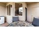 Small patio with table and chairs, offering an outdoor space at 7009 E Acoma Dr # 1143, Scottsdale, AZ 85254