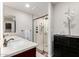 Elegant bathroom with double sinks, a large shower, and dark wood cabinets at 7813 N Via Del Sol --, Scottsdale, AZ 85258