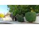 House exterior with lush landscaping and gated entry at 7813 N Via Del Sol --, Scottsdale, AZ 85258