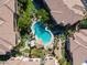Aerial view showcasing a community pool and surrounding buildings at 7887 N 16Th St # 116, Phoenix, AZ 85020