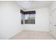 Well-lit bedroom with corner window and ceiling fan at 7887 N 16Th St # 116, Phoenix, AZ 85020