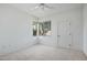 Bright bedroom with window and ceiling fan at 7887 N 16Th St # 116, Phoenix, AZ 85020