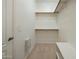 Large walk-in closet with double hanging rods and shelving at 7887 N 16Th St # 116, Phoenix, AZ 85020