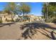 Gated entry to Canyon Gate community with security guard house at 7887 N 16Th St # 116, Phoenix, AZ 85020