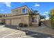 Two-story Canyon Gate condo with attached two-car garage and walkway at 7887 N 16Th St # 116, Phoenix, AZ 85020