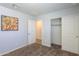 Bedroom with double door closet and carpet flooring at 833 S Parker Pl, Casa Grande, AZ 85122