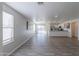 Open living area with wood-look floors and kitchen views at 833 S Parker Pl, Casa Grande, AZ 85122