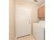 Laundry room with washer, dryer, and cabinets at 8729 W Tuckey Ln, Glendale, AZ 85305