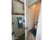 Small half bathroom with toilet and pedestal sink at 900 S Canal Dr # 204, Chandler, AZ 85225