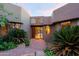 Desert landscape surrounds this modern home's inviting entryway at 10040 E Happy Valley Rd # 204, Scottsdale, AZ 85255