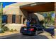 Gated entrance with attendant welcoming residents and guests at 10040 E Happy Valley Rd # 204, Scottsdale, AZ 85255