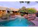 Stunning pool and spa with a waterfall feature at 10040 E Happy Valley Rd # 204, Scottsdale, AZ 85255