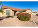 Single story home with attached two-car garage and nicely landscaped yard at 1450 E Buena Vista Dr, Chandler, AZ 85249