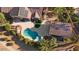 Aerial view of backyard oasis with pool, spa and casita at 16488 W Wilshire Dr, Goodyear, AZ 85395