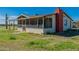 Single-story home with brick exterior, screened porch, and cactus at 1907 E Foothill St, Apache Junction, AZ 85119