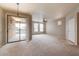 Living room with patio access and neutral color palette at 20801 N 90Th Pl # 222, Scottsdale, AZ 85255