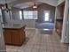 Kitchen with an island and view into the living room at 2342 E Kesler Ln, Chandler, AZ 85225