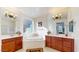Large bathroom with soaking tub, double vanity, and separate shower at 30855 N 138Th Ave, Peoria, AZ 85383