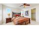 Bright bedroom with double closets and ceiling fan at 30855 N 138Th Ave, Peoria, AZ 85383
