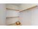 Walk-in closet with double hanging rods and shelving at 30855 N 138Th Ave, Peoria, AZ 85383