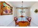 Formal dining room with large table and chandelier at 30855 N 138Th Ave, Peoria, AZ 85383