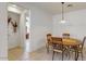 Cozy dining area featuring a wood table and four chairs at 30855 N 138Th Ave, Peoria, AZ 85383
