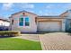 One-story home with a two-car garage and landscaped front yard at 30855 N 138Th Ave, Peoria, AZ 85383