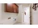 Laundry room with upper cabinets and tiled floor at 30855 N 138Th Ave, Peoria, AZ 85383