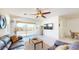 Living room with sliding glass doors leading to backyard at 30855 N 138Th Ave, Peoria, AZ 85383
