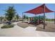 Community playground with shade structure and play equipment at 30855 N 138Th Ave, Peoria, AZ 85383