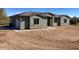 Single-story home with stone accents and a two-car garage at 35815 N 138Th Pl, Scottsdale, AZ 85262