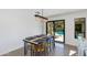 Bright dining area with pool view from sliding door at 5239 E Waltann Ln, Scottsdale, AZ 85254