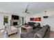 Spacious living room featuring a fireplace and comfy seating at 5239 E Waltann Ln, Scottsdale, AZ 85254