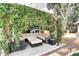 Relaxing patio with covered seating area and lush greenery at 5239 E Waltann Ln, Scottsdale, AZ 85254